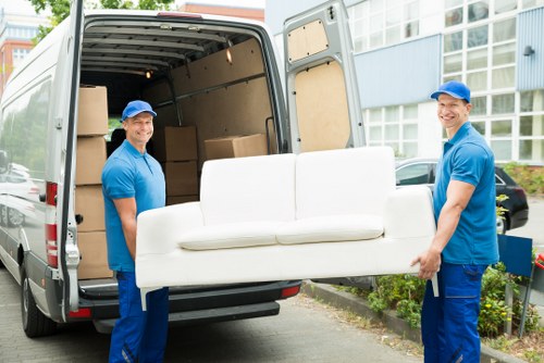 Professional Movers Handling Office Equipment