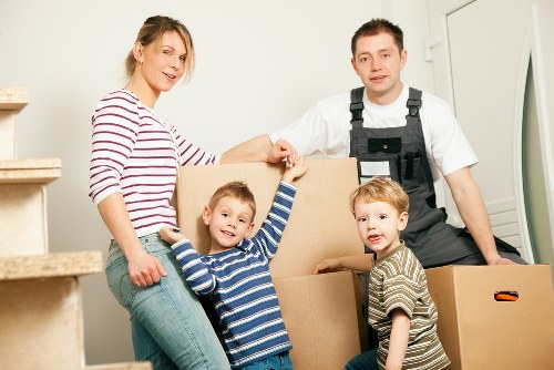 Professional movers loading a truck in Kensington