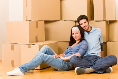 Professional office movers handling equipment