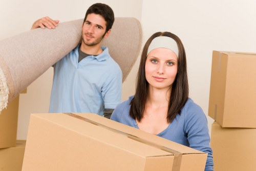 Professional movers packing a home